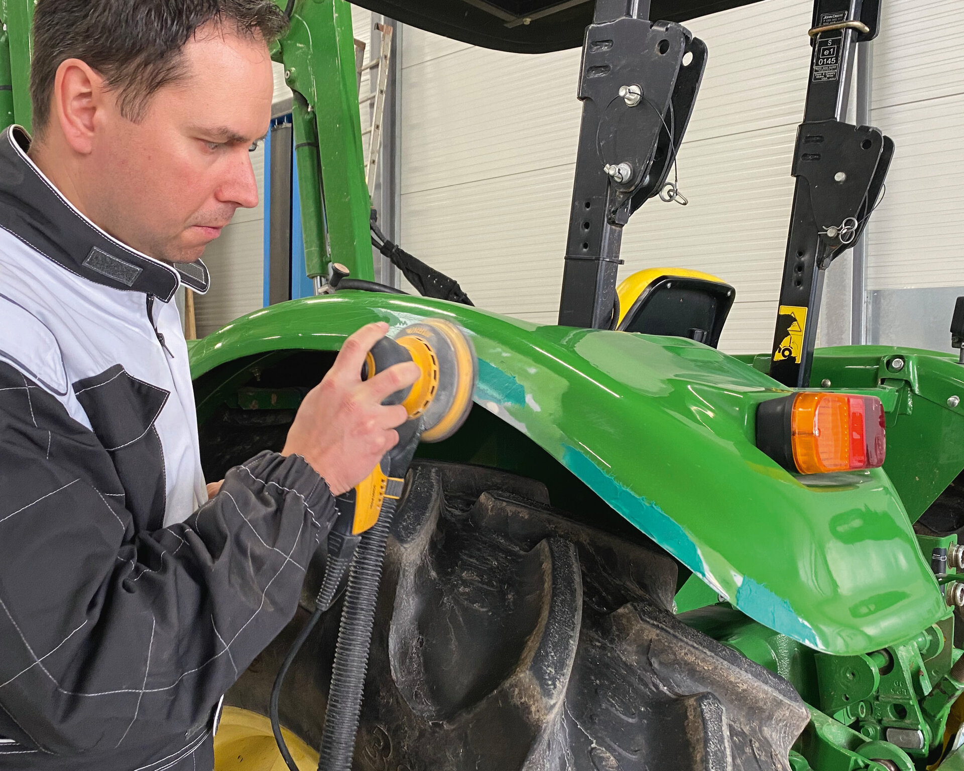 Paintwork repairs to construction vehicle