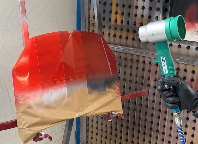 Bonnet painted red during drying