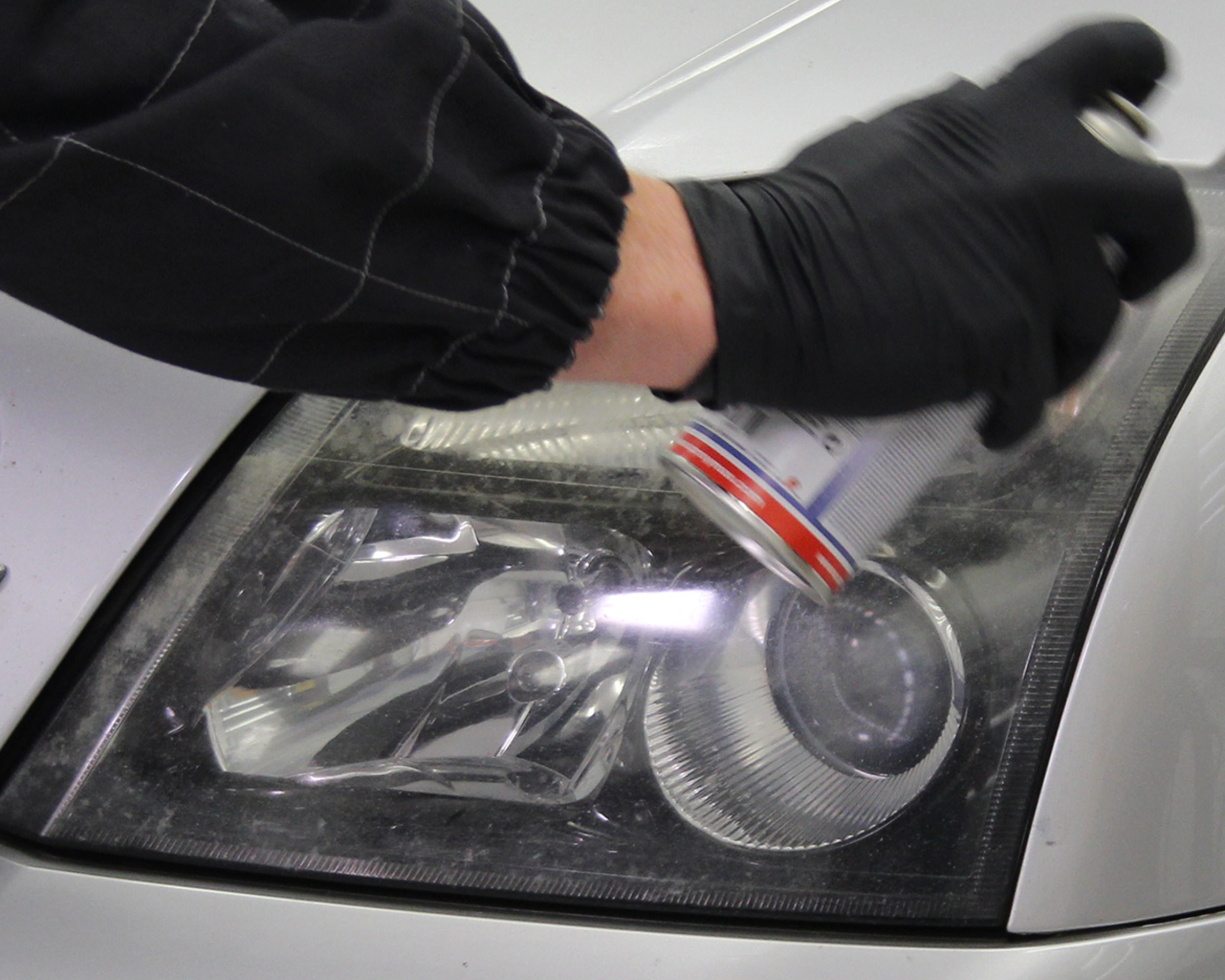 Headlight lens recoating