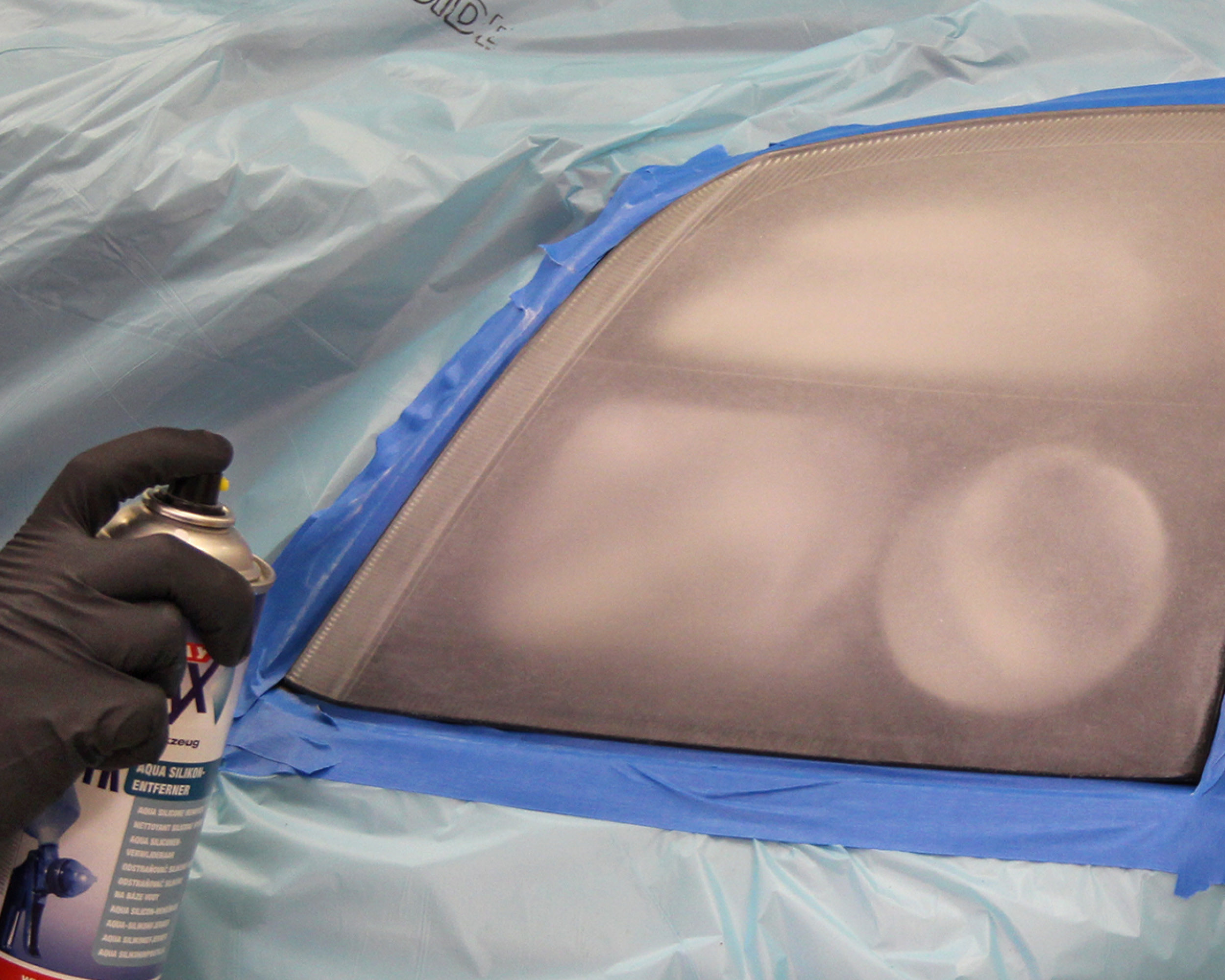 Headlight lens recoating