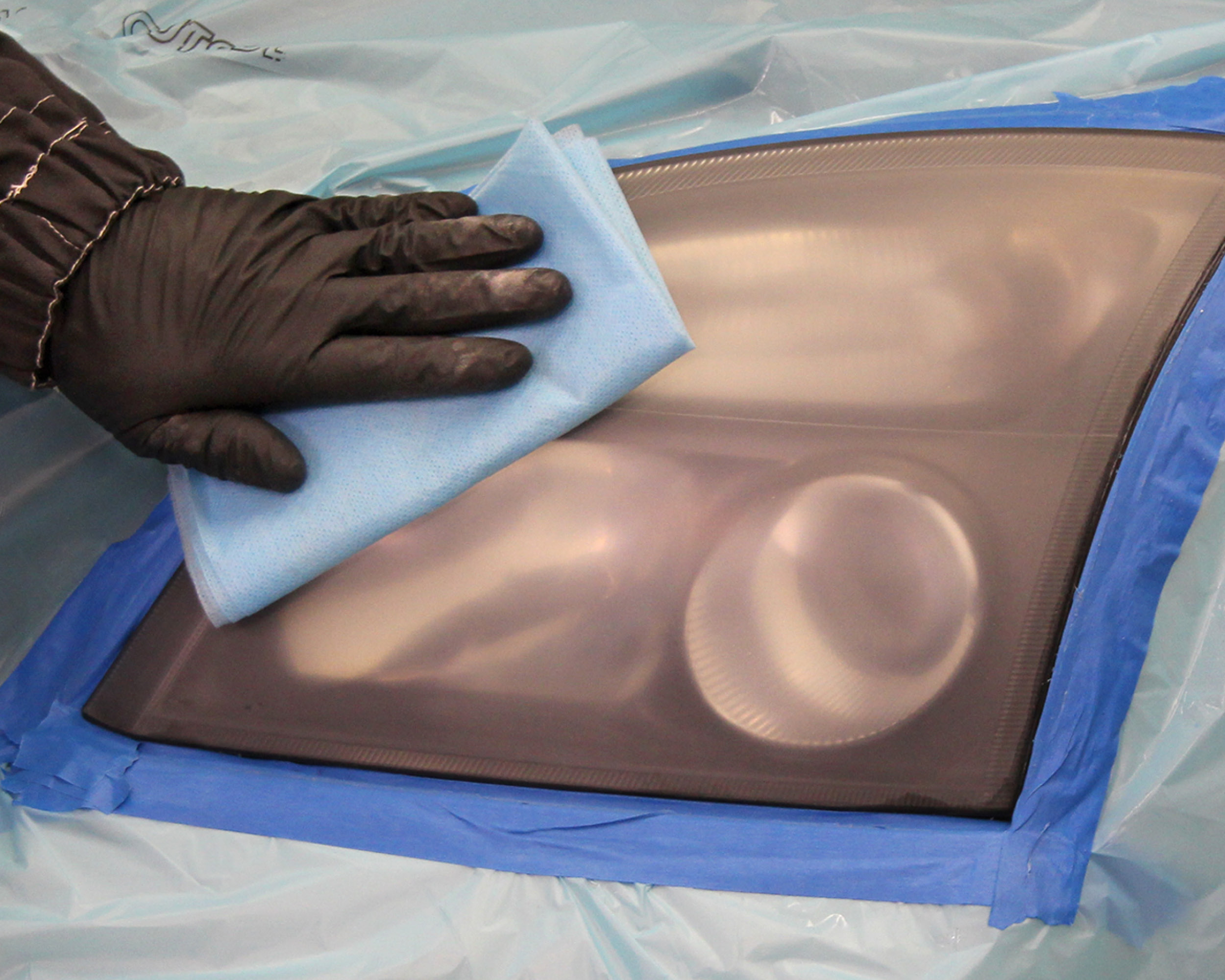 Headlight lens recoating