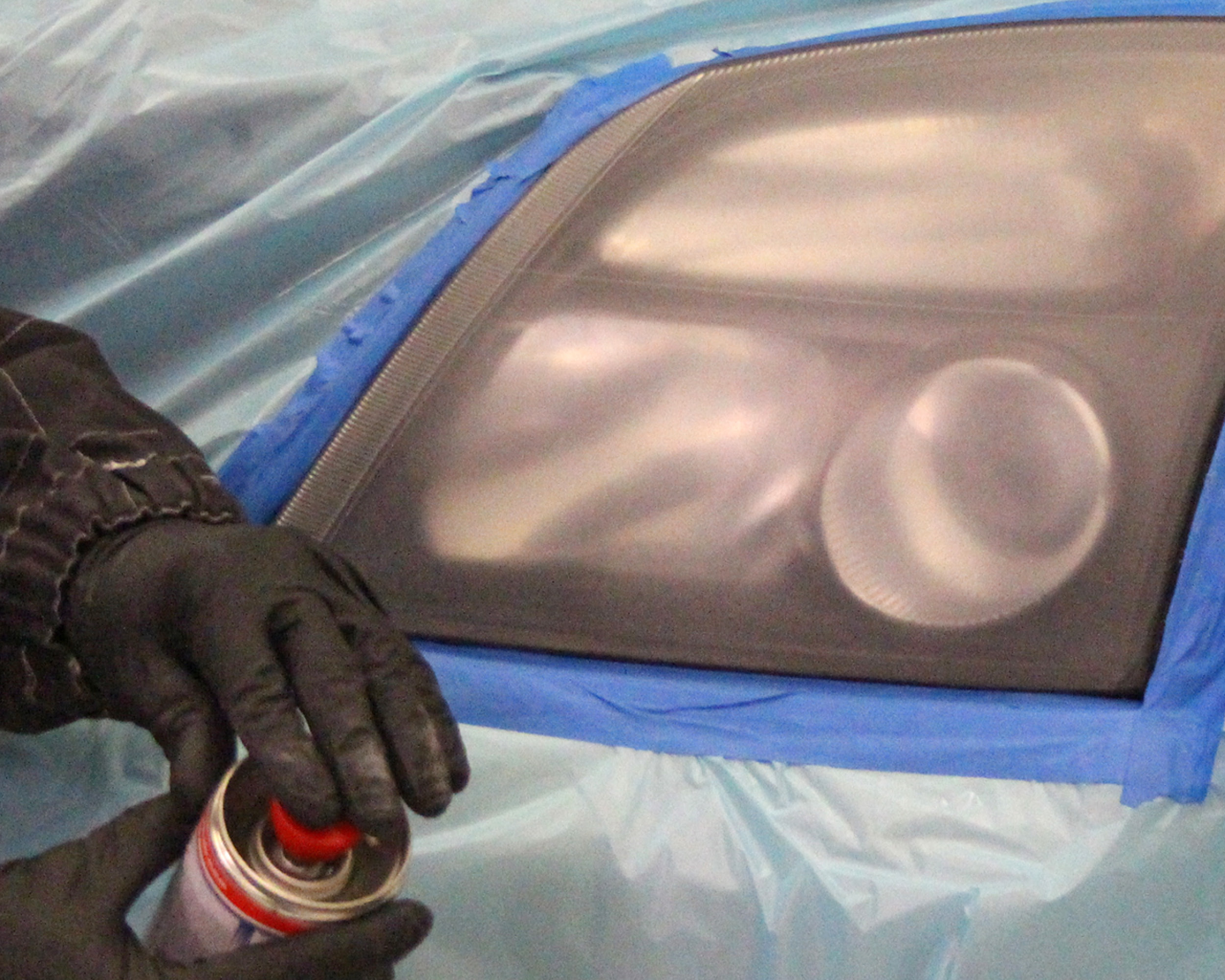 Headlight lens recoating